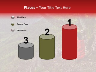 A Man Sitting On Top Of A Mountain Next To A Tree PowerPoint Template