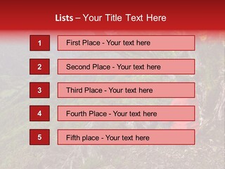 A Man Sitting On Top Of A Mountain Next To A Tree PowerPoint Template