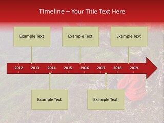 A Man Sitting On Top Of A Mountain Next To A Tree PowerPoint Template