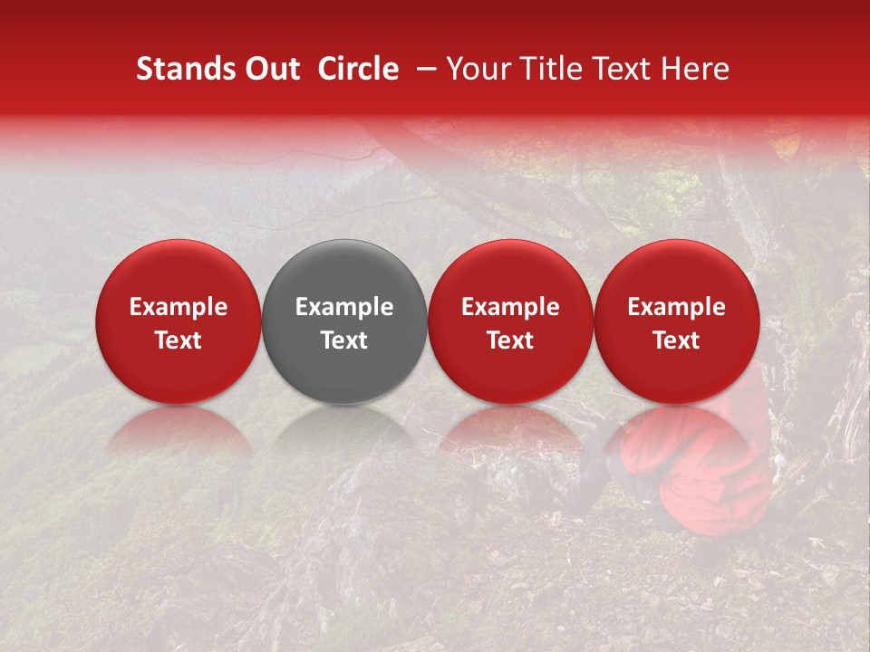 A Man Sitting On Top Of A Mountain Next To A Tree PowerPoint Template