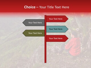 A Man Sitting On Top Of A Mountain Next To A Tree PowerPoint Template