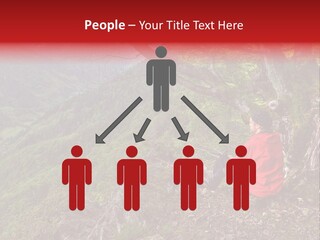 A Man Sitting On Top Of A Mountain Next To A Tree PowerPoint Template