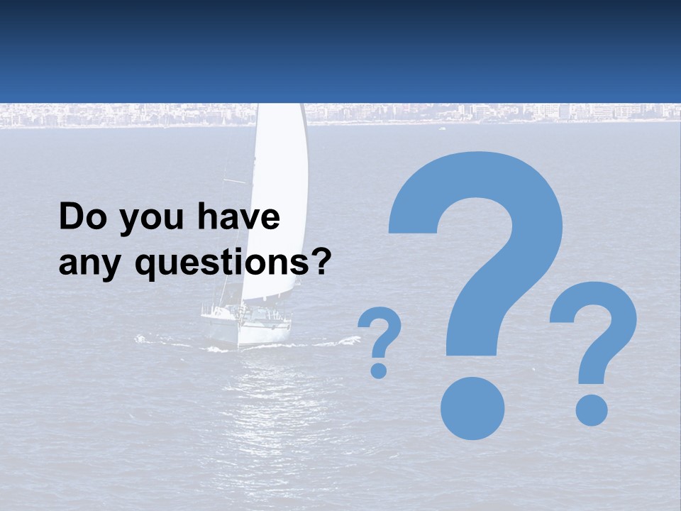 A Sailboat In A Body Of Water With A City In The Background PowerPoint Template