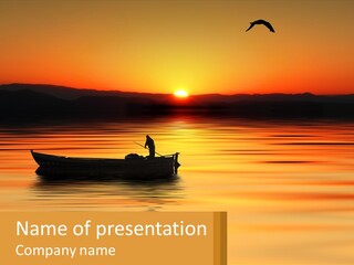 A Boat Floating On Top Of A Lake At Sunset PowerPoint Template