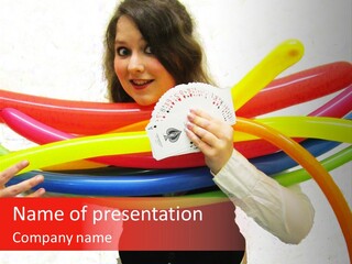 A Woman Holding Up A Stack Of Colorful Rings And Playing Cards PowerPoint Template