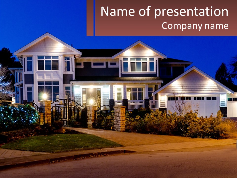 A Large House With A Lot Of Lights On It PowerPoint Template