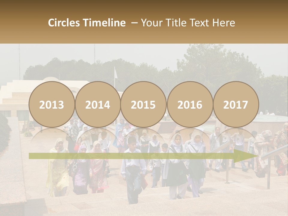 A Group Of People Walking Down A Street Next To A Building PowerPoint Template