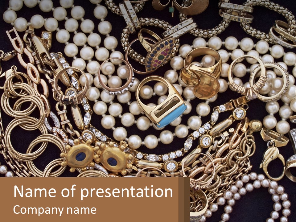 A Bunch Of Pearls And Jewelry On A Table PowerPoint Template