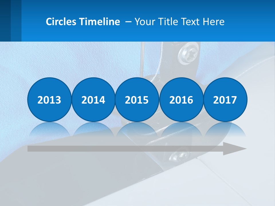A Close Up Of A Sewing Machine With A Blue Cover PowerPoint Template