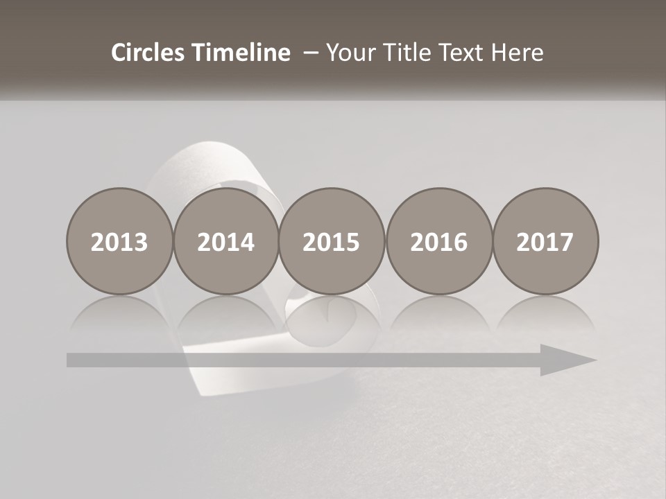 A White Paper Ring With The Letter B On It PowerPoint Template