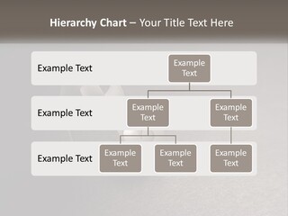 A White Paper Ring With The Letter B On It PowerPoint Template