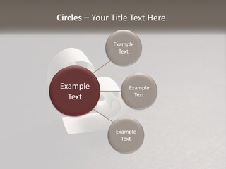 A White Paper Ring With The Letter B On It PowerPoint Template