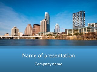 A City Skyline With A River In The Foreground PowerPoint Template