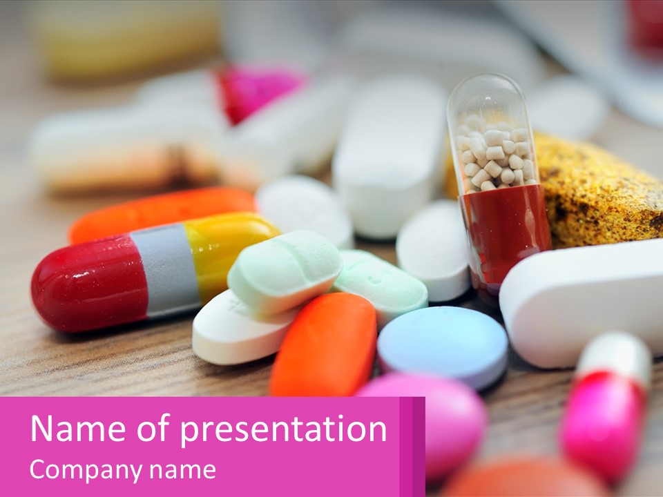 A Table Topped With Lots Of Pills And Tablets PowerPoint Template