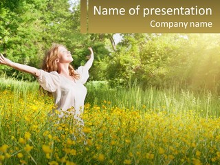 A Woman Standing In A Field With Her Arms Outstretched PowerPoint Template