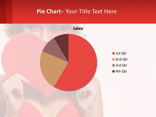 A Woman Holding A Red Heart In Front Of Her Face PowerPoint Template