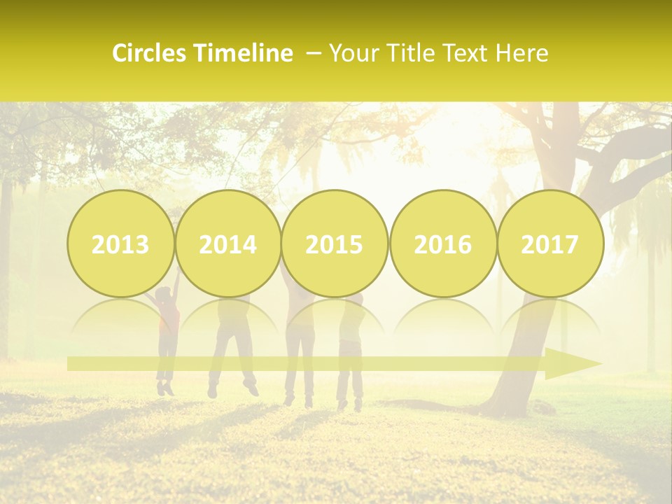 A Group Of People Standing Under A Tree With Their Arms In The Air PowerPoint Template