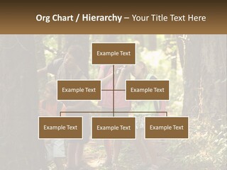 A Group Of Children Standing In The Woods PowerPoint Template