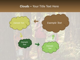 A Group Of Children Standing In The Woods PowerPoint Template