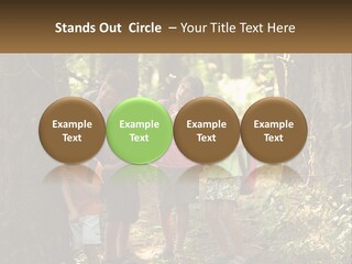 A Group Of Children Standing In The Woods PowerPoint Template