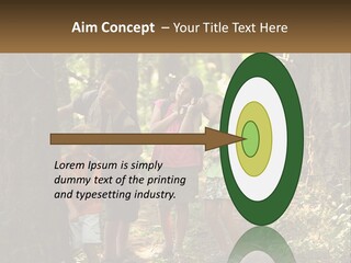 A Group Of Children Standing In The Woods PowerPoint Template