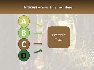 A Group Of Children Standing In The Woods PowerPoint Template