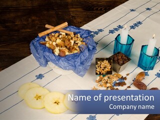 A Table Topped With A Bowl Of Fruit And Nuts PowerPoint Template