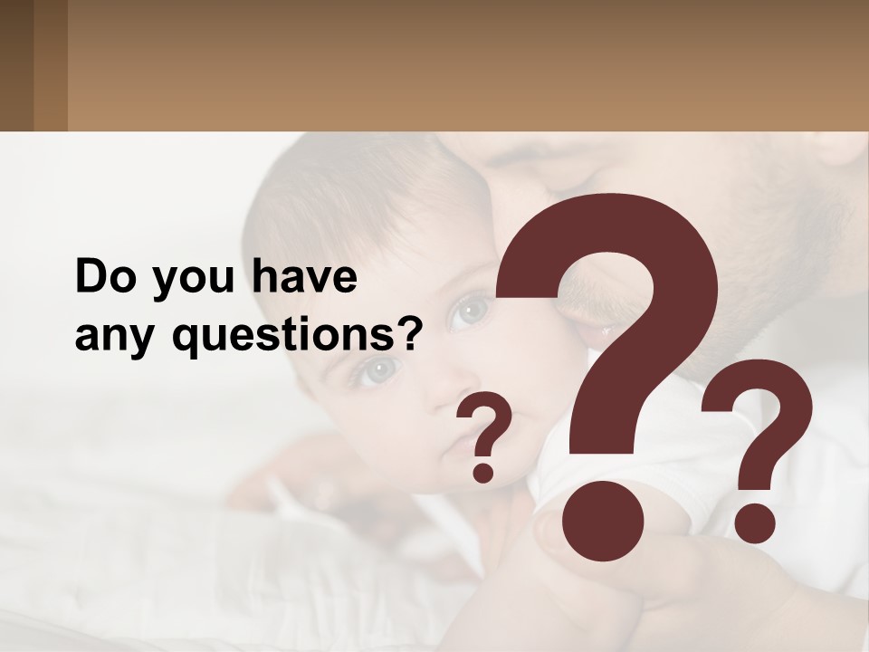 A Man Holding A Baby In His Arms PowerPoint Template