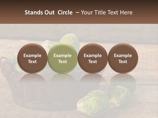 A Basket Of Brussel Sprouts On A Wooden Table PowerPoint Template