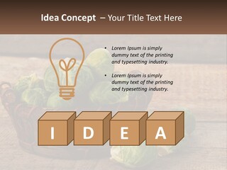 A Basket Of Brussel Sprouts On A Wooden Table PowerPoint Template