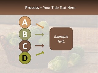 A Basket Of Brussel Sprouts On A Wooden Table PowerPoint Template