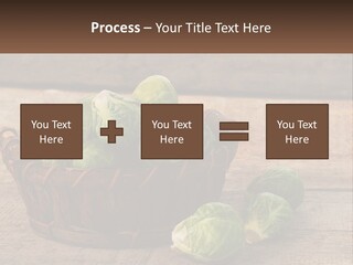 A Basket Of Brussel Sprouts On A Wooden Table PowerPoint Template