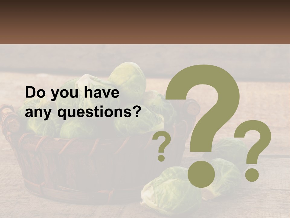 A Basket Of Brussel Sprouts On A Wooden Table PowerPoint Template