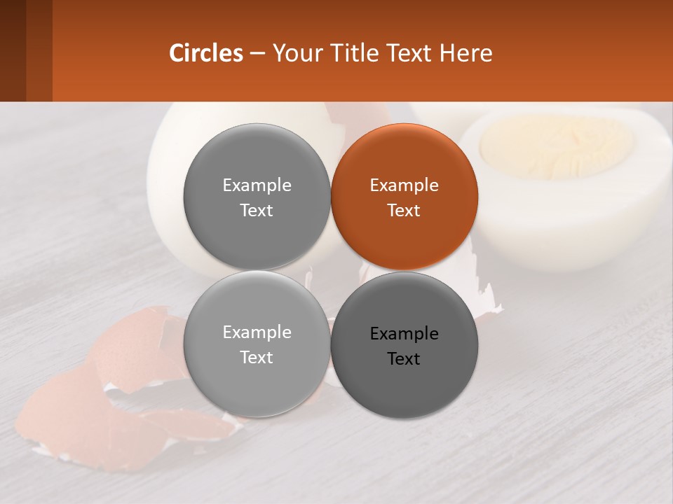 A Hard Boiled Egg On A Wooden Table PowerPoint Template