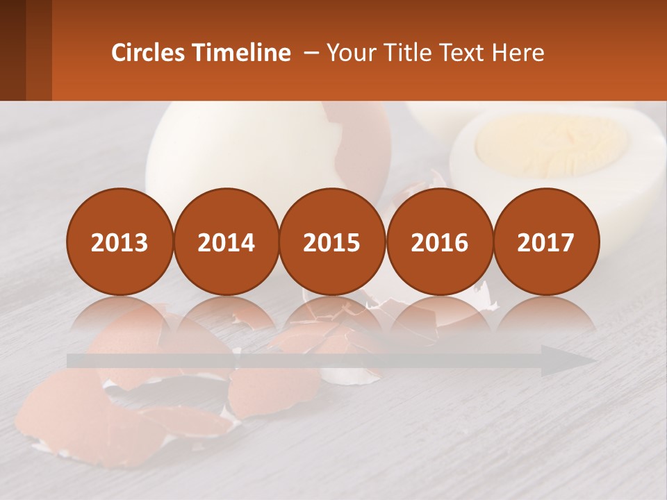 A Hard Boiled Egg On A Wooden Table PowerPoint Template