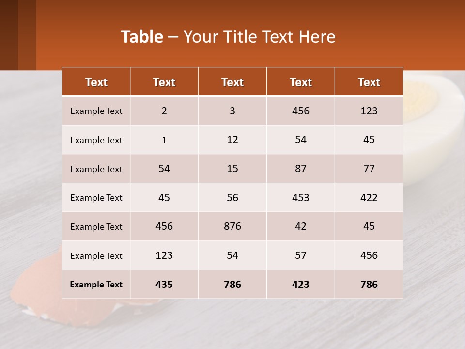 A Hard Boiled Egg On A Wooden Table PowerPoint Template