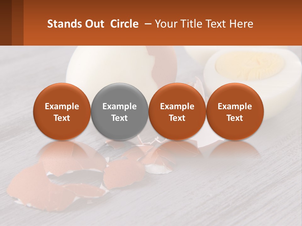 A Hard Boiled Egg On A Wooden Table PowerPoint Template