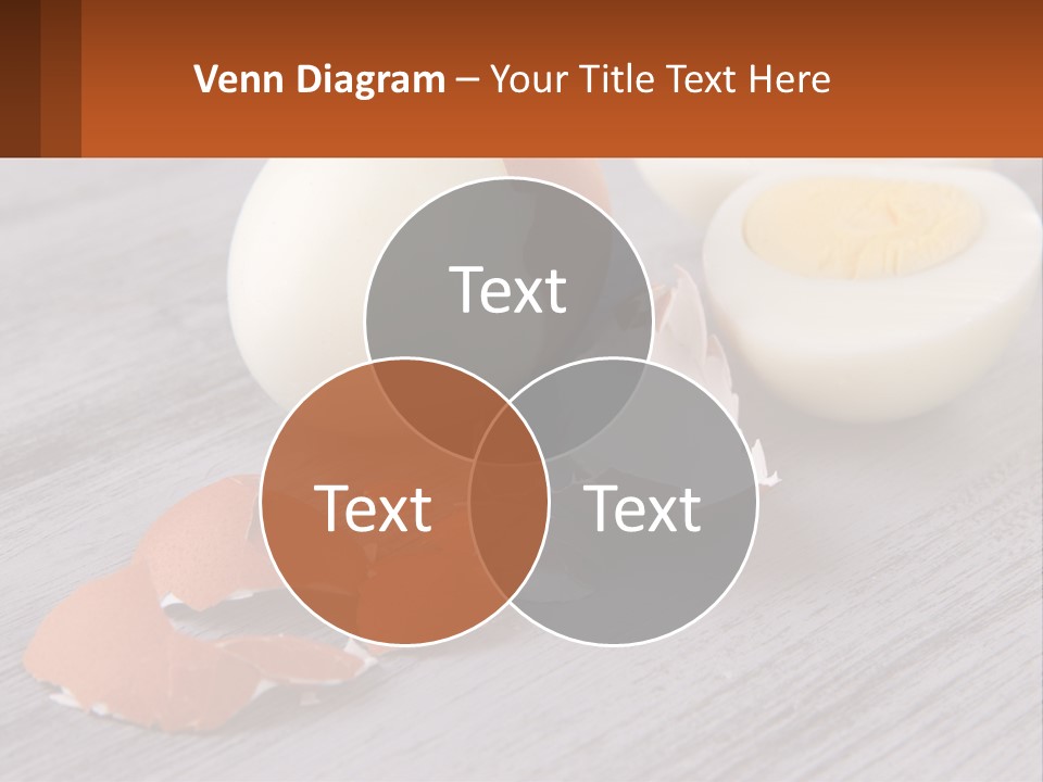 A Hard Boiled Egg On A Wooden Table PowerPoint Template