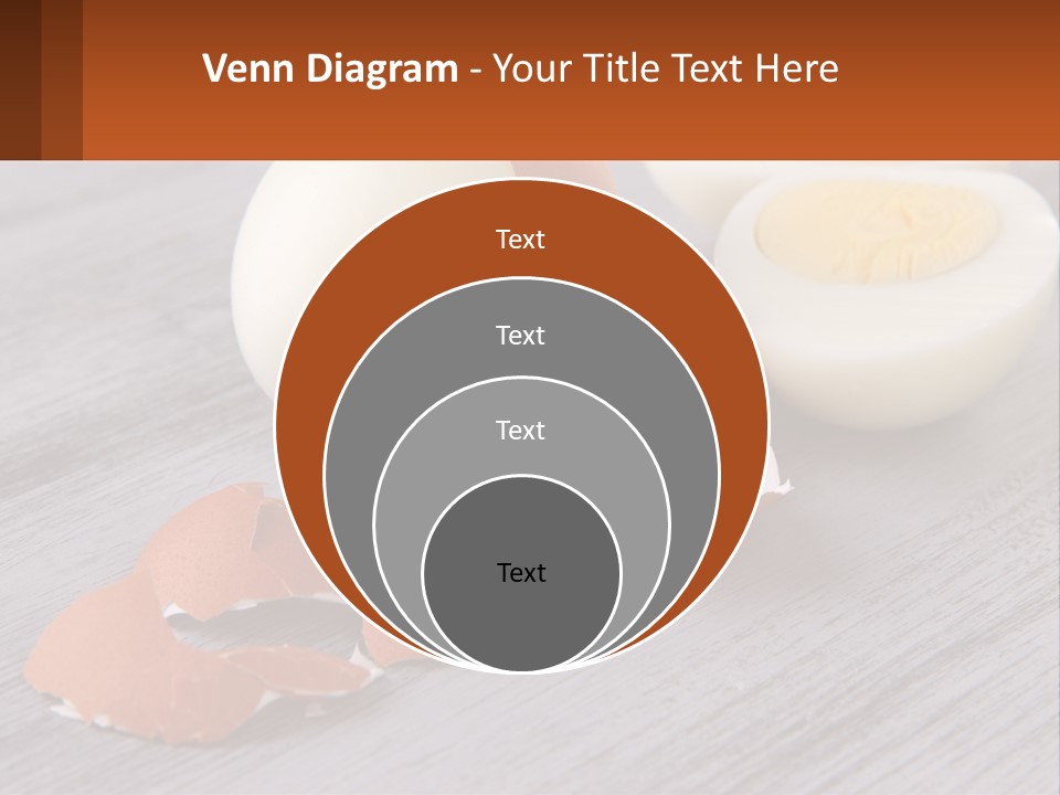 A Hard Boiled Egg On A Wooden Table PowerPoint Template