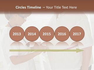 A Nurse And A Patient Looking At Something On A Clipboard PowerPoint Template