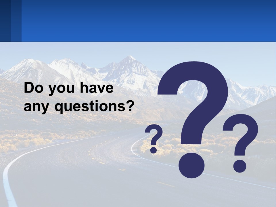 A Road In The Middle Of A Mountain Range PowerPoint Template