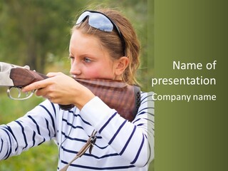 A Girl Is Holding A Gun And Aiming It PowerPoint Template