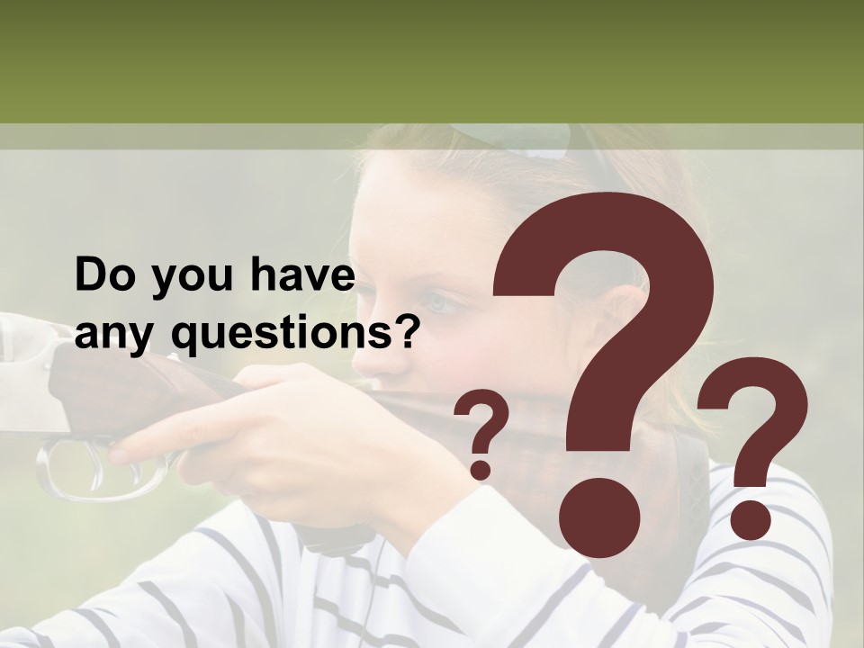 A Girl Is Holding A Gun And Aiming It PowerPoint Template