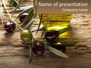 A Bottle Of Olive Oil And Some Olives On A Table PowerPoint Template