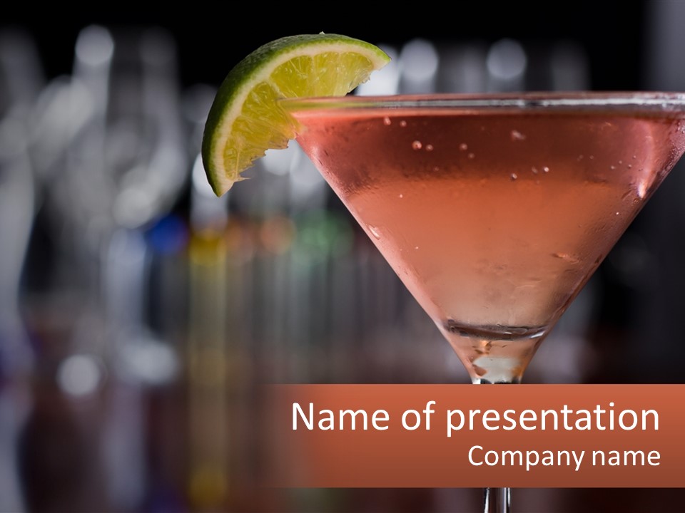 A Pink Cocktail With A Lime Slice On The Rim PowerPoint Template