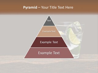 A Glass Of Water With Limes And Ice On A Wooden Table PowerPoint Template