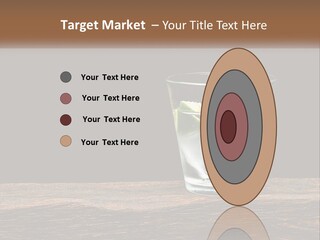 A Glass Of Water With Limes And Ice On A Wooden Table PowerPoint Template