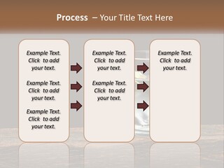 A Glass Of Water With Limes And Ice On A Wooden Table PowerPoint Template