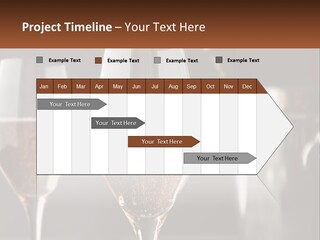 A Couple Of Wine Glasses Sitting On Top Of A Table PowerPoint Template