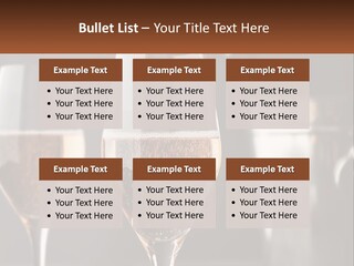 A Couple Of Wine Glasses Sitting On Top Of A Table PowerPoint Template